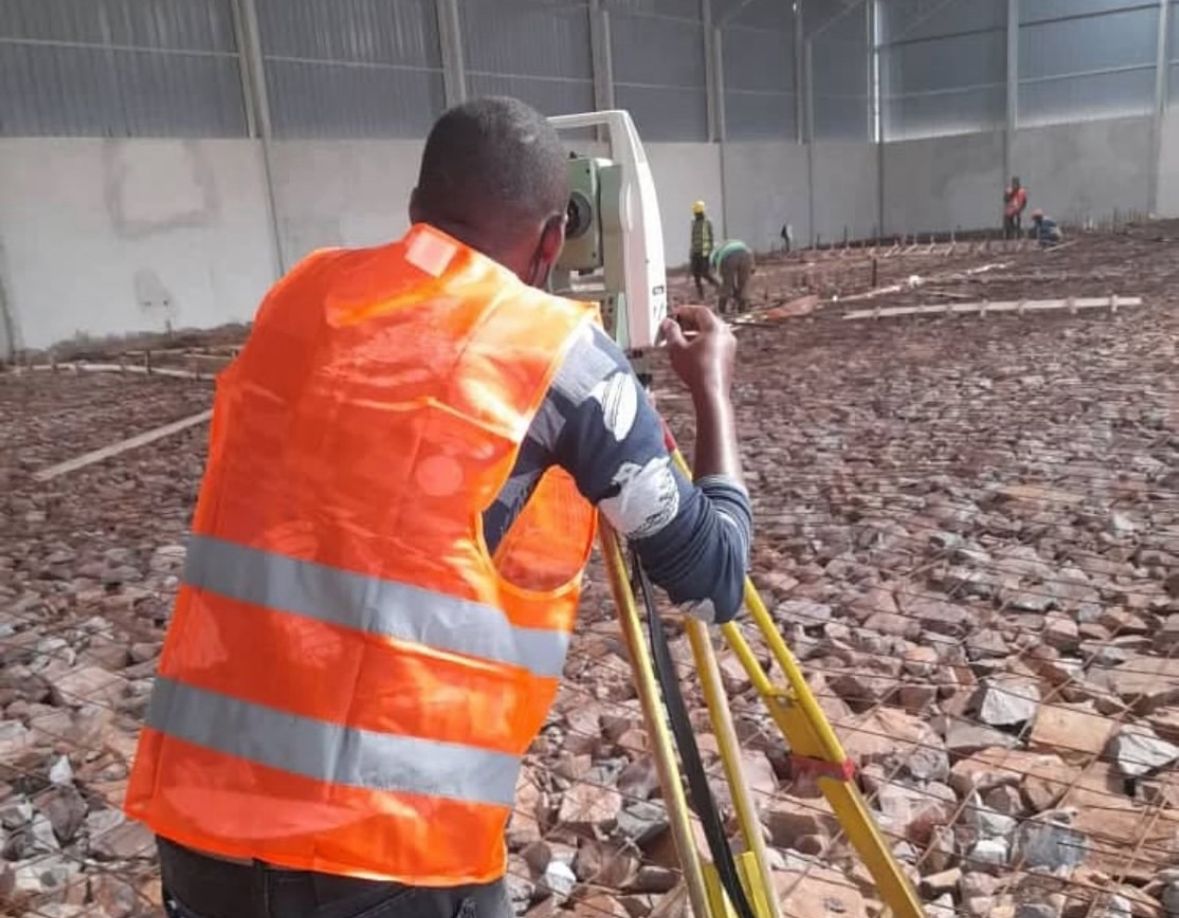 Orange-vest surveyor